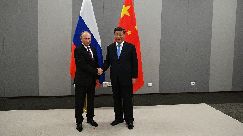 Президент Владимир Путин прилетел в Китай